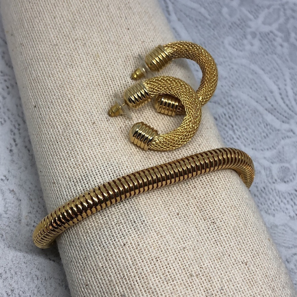 Curated bundle vintage gold tone mesh bracelet and earrings costume jewelry.